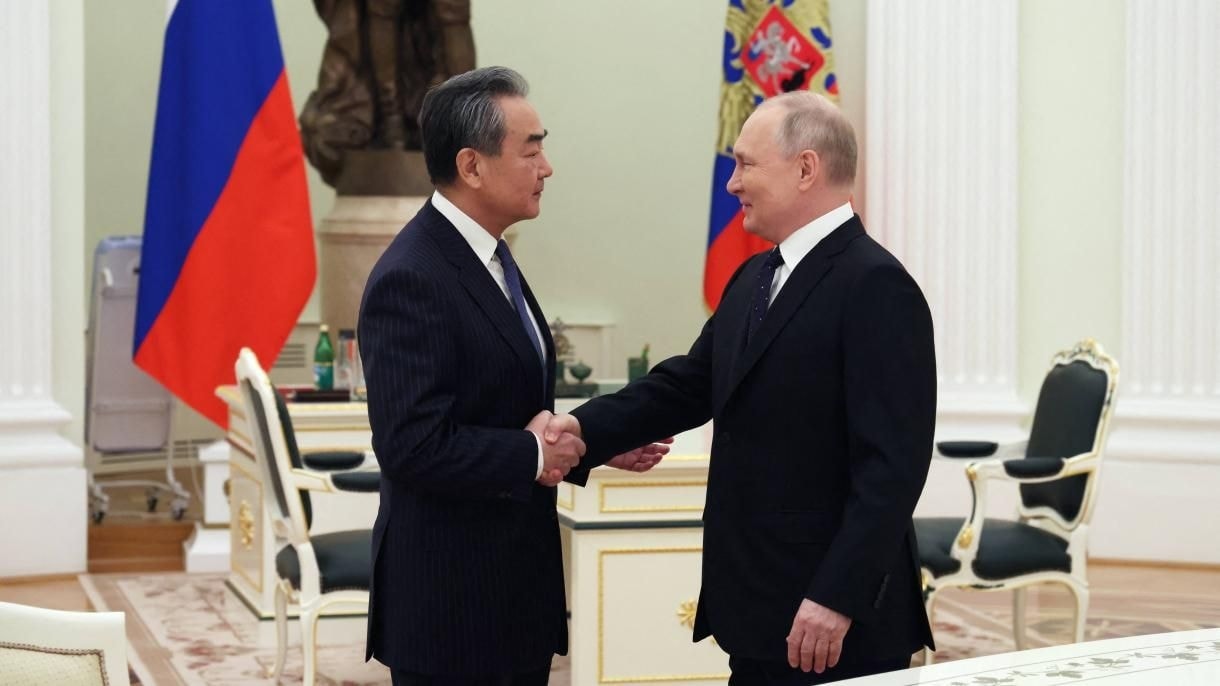 Putin con Wang Yi