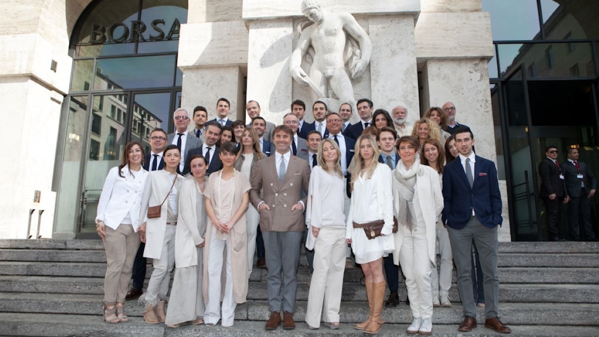Il team di Brunello Cucinelli il giorno della quotazione alla borsa di Milano nel 2012 (courtesy Brunello Cucinelli)