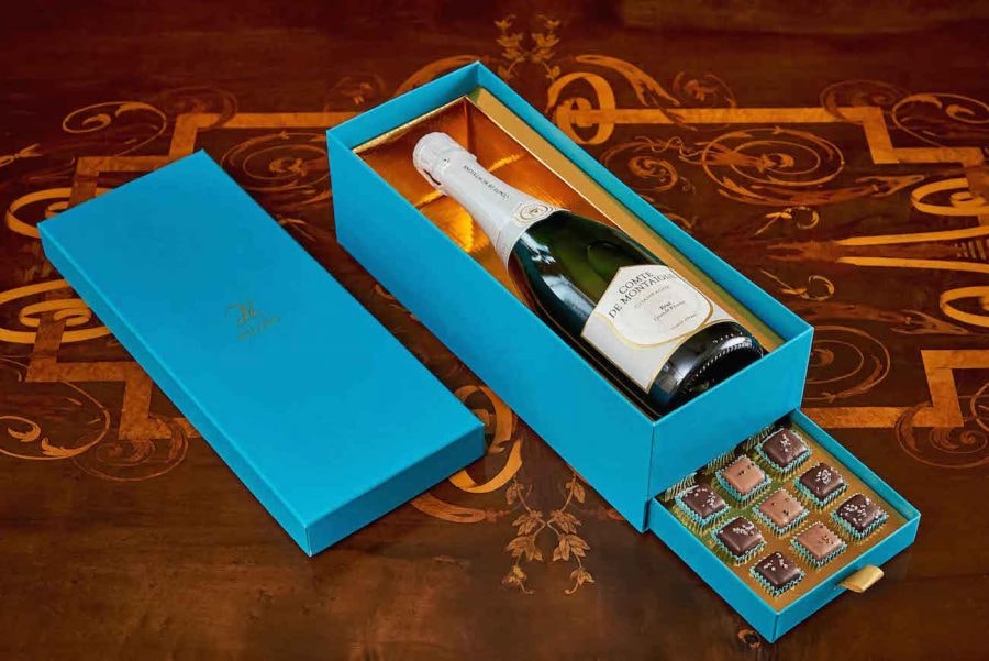 La raffinata selezione di praline di T’à Milano allo Champagne Brut Grand Réserve di Comte de Montaigne.