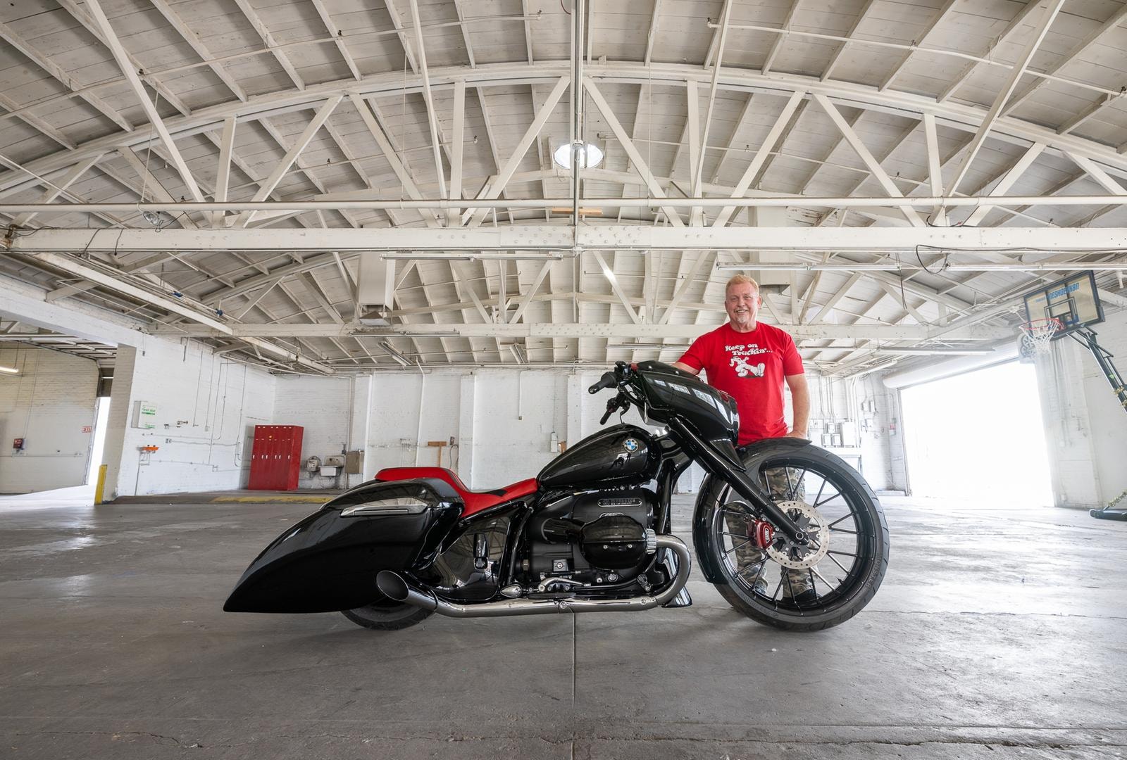 Paul Yaffe with his custom BMW R-18 in a Phoenix, Arizona warehouse. Wednesday, December 27, 2023. Photography ©2023 Michael Lichter.