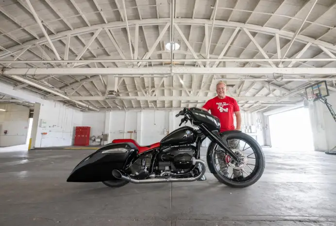 Paul Yaffe with his custom BMW R-18 in a Phoenix, Arizona warehouse. Wednesday, December 27, 2023. Photography ©2023 Michael Lichter.