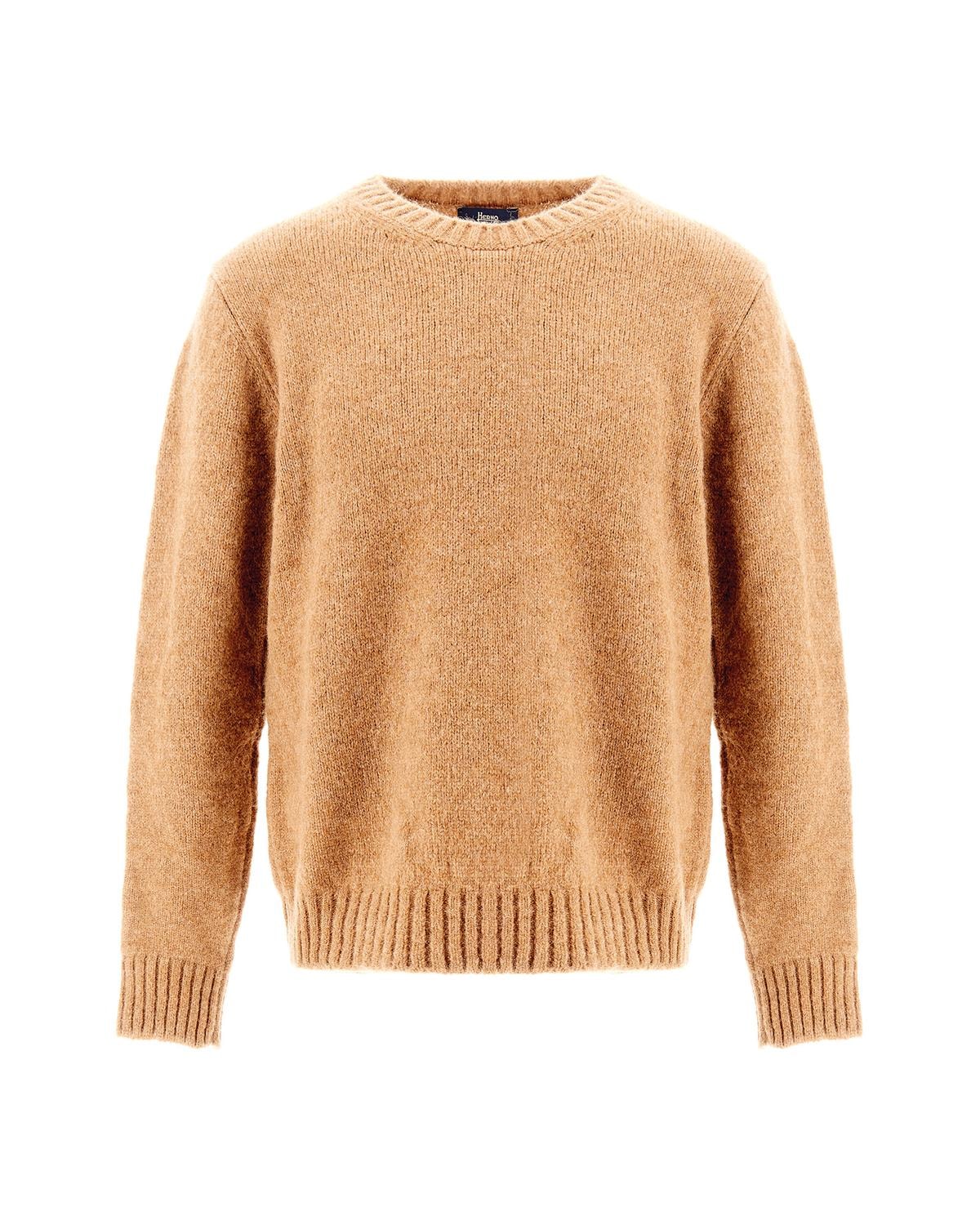 Dal girocollo al dolcevita: 7 maglie iconiche per l’uomo elegante