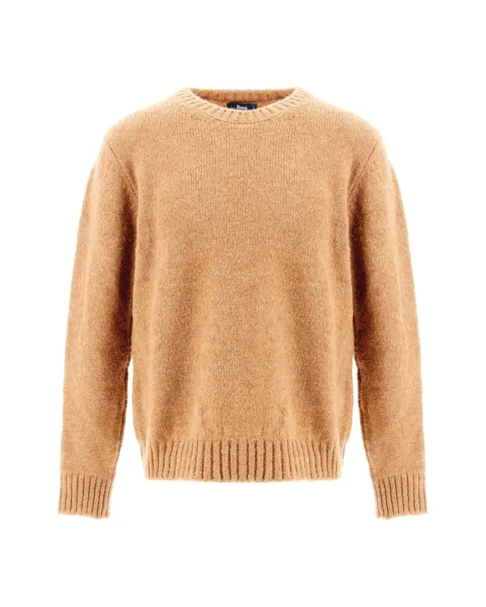 Dal girocollo al dolcevita: 7 maglie iconiche per l’uomo elegante