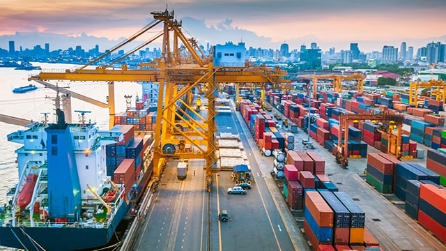 Container ship in the harbor in Asia ,