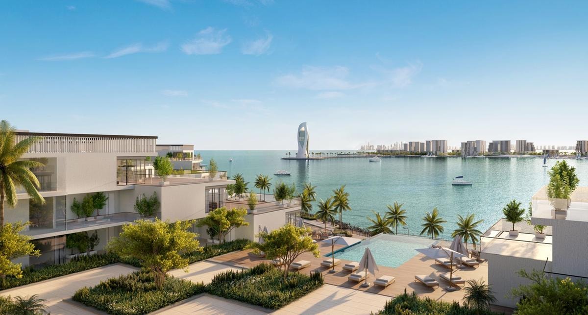 Elie Saab continua a investire nell’immobiliare: da Dubai alle Maldive, ai Caraibi, passando per Londra e per il Qatar, a Qetaifan Island North, con le residenze  Les Vagues (sopra), di cui firma gli interni, progetto realizzato con Dar Al Arkan.