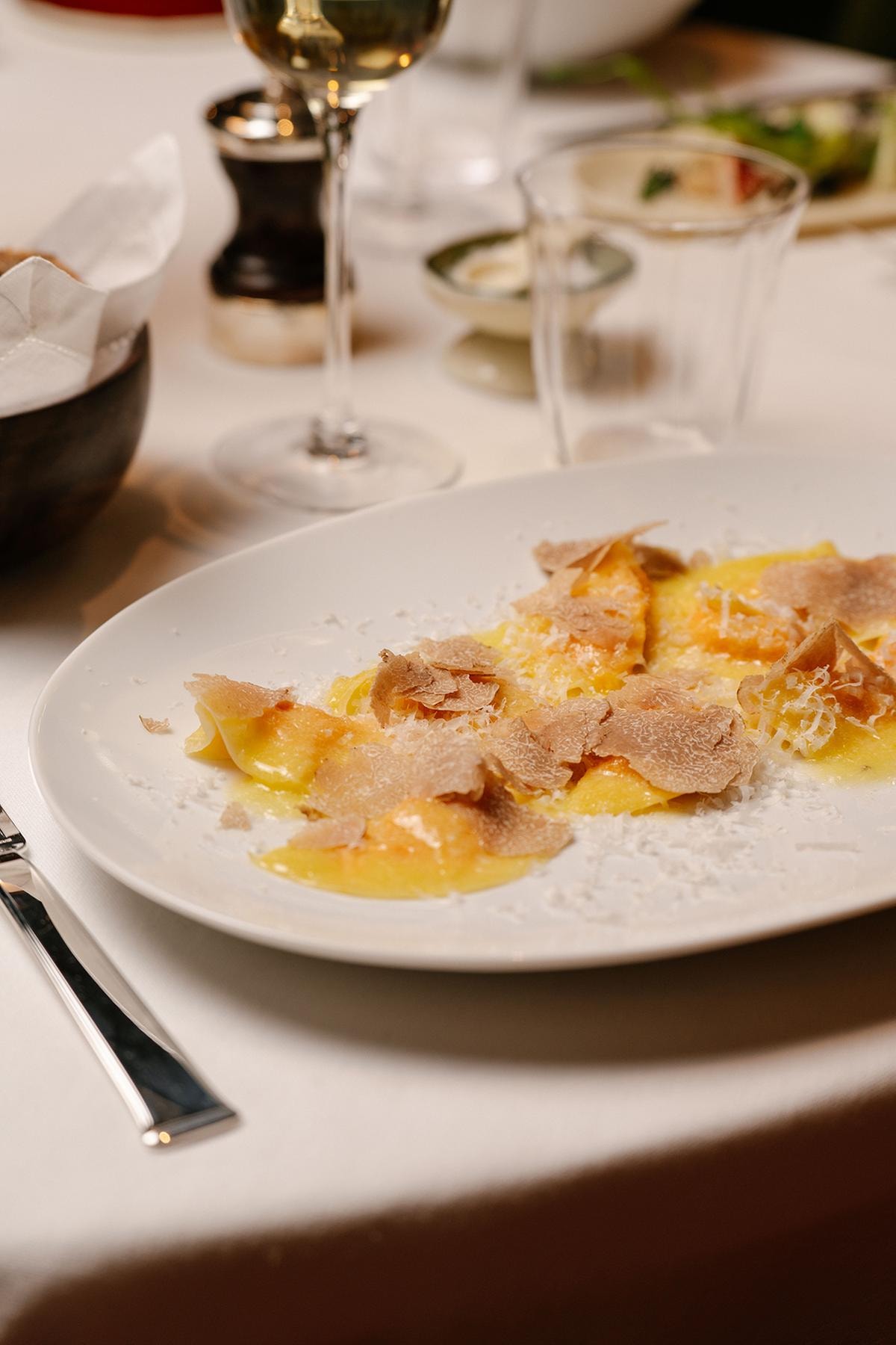 Tortelli di zucca, burro e parmigiano con tartufo bianco di San Miniato