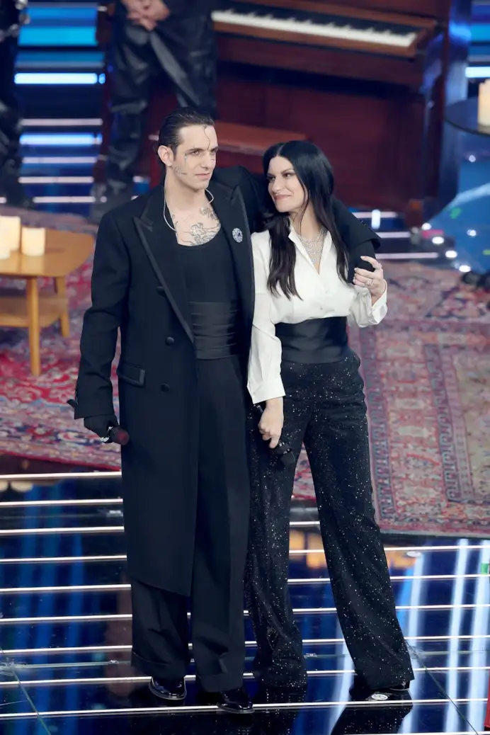 Achille Lauro in Dolce&Gabbana e Laura Pausini in Giorgio Armani (photo Daniele Venturelli/Getty images, courtesy Dolce&Gabbana))