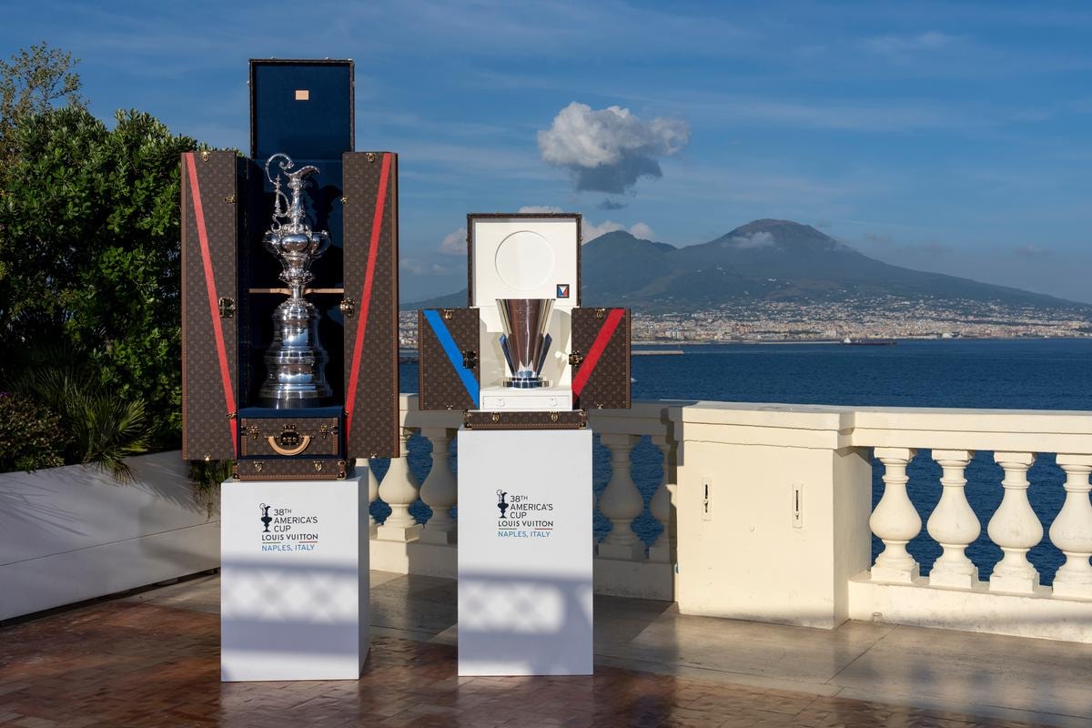 May 27, 2025. Louis Vuitton 38 America’s Cup. America’s Cup trophy and Louis Vuitton trophy  in Naples, Mount Vesuvius in the background.